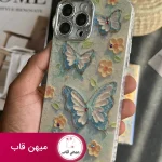 قاب گوشی آیفون گل بابونه و پروانه آبرنگی محافظ لنزدار