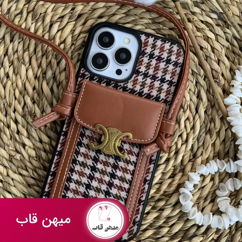 قاب موبایل آیفون پارچه ای و فلزی طرح باربری جاکارتی + بندست