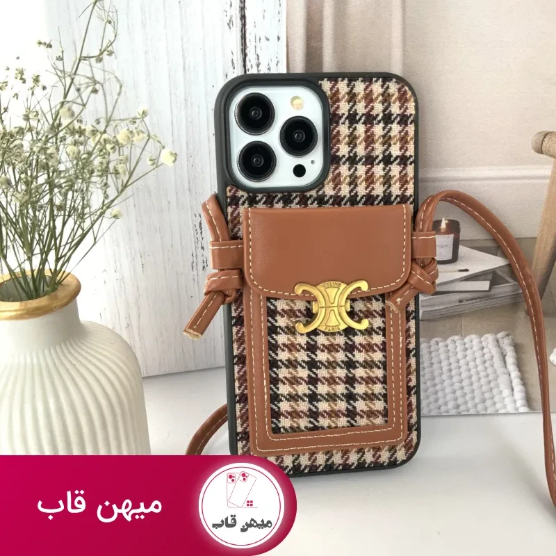 قاب موبایل آیفون پارچه ای و فلزی طرح باربری جاکارتی + بندست