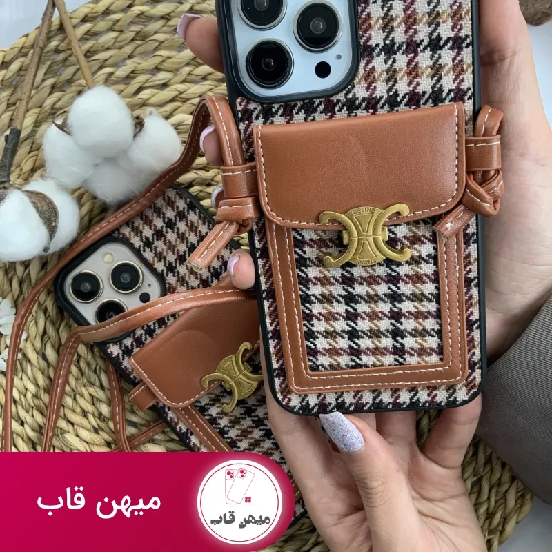 قاب موبایل آیفون پارچه ای و فلزی طرح باربری جاکارتی + بندست