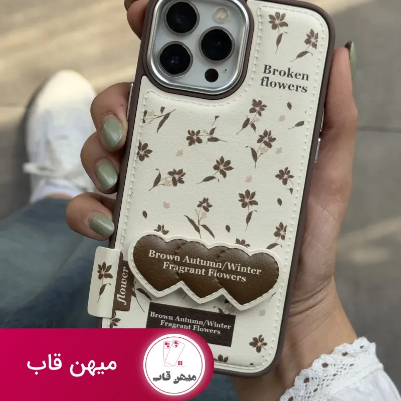 قاب موبایل آیفون گل چهارفصل فرگننت چرمی + استندقلبی