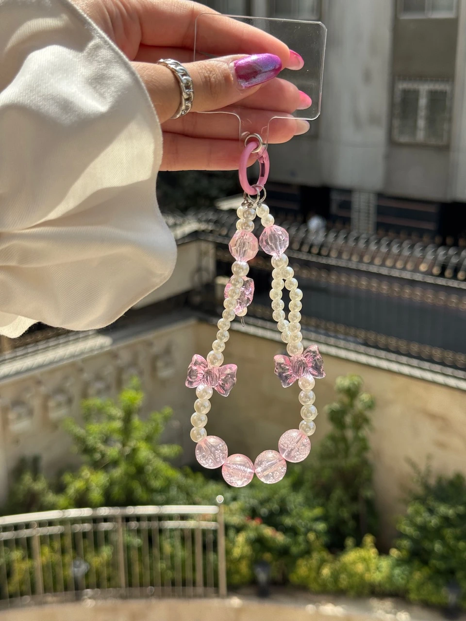 آویز مروارید و پاپیون صورتی