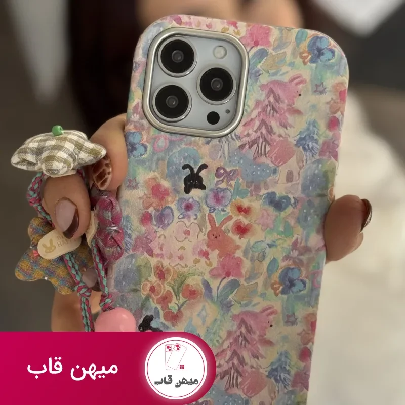 قاب موبایل آیفون خرگوش واندرلند + بندست گل پارچه ای