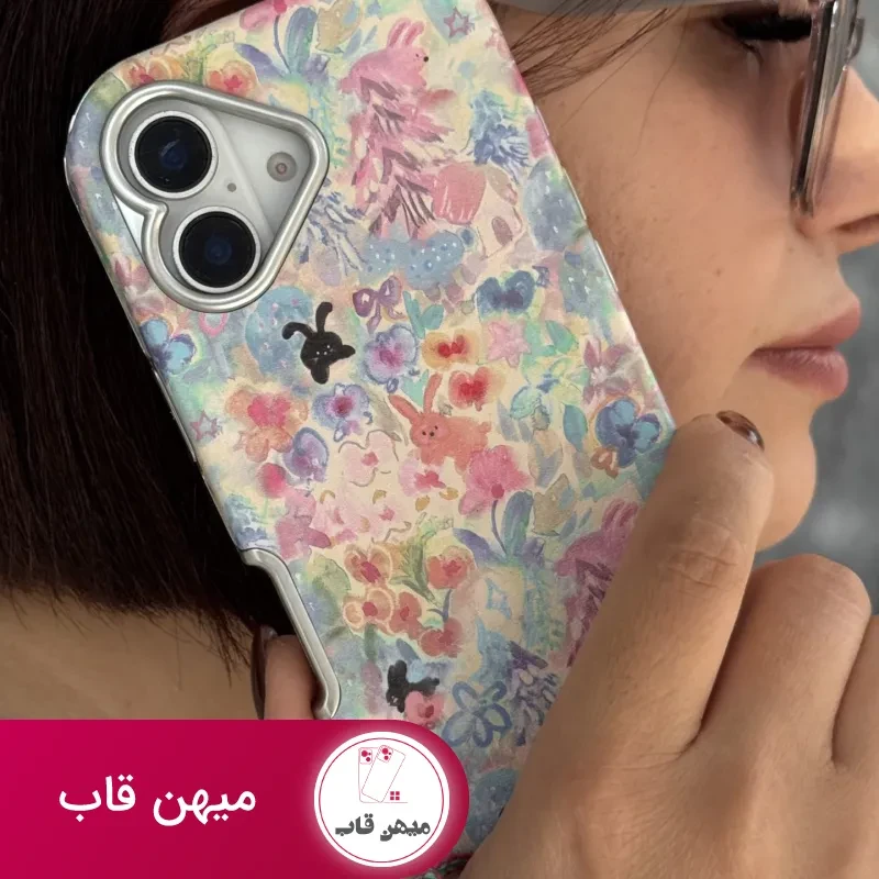 قاب موبایل آیفون خرگوش واندرلند + بندست گل پارچه ای