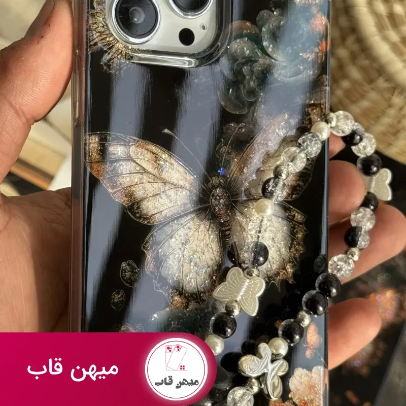 قاب موبایل آیفون پروانه ترنسپرنت مشکی پولکی طلایی