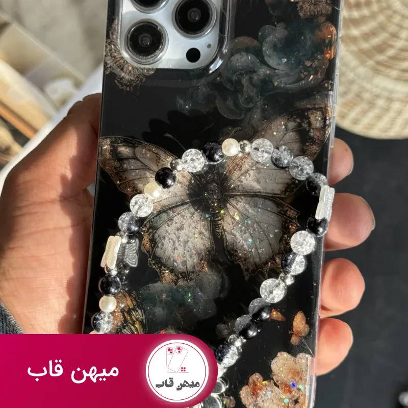 قاب موبایل آیفون پروانه ترنسپرنت مشکی پولکی طلایی