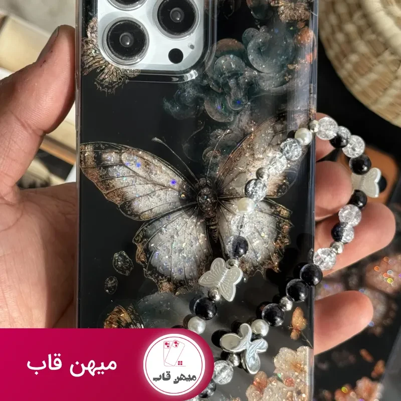 قاب موبایل آیفون پروانه ترنسپرنت مشکی پولکی طلایی