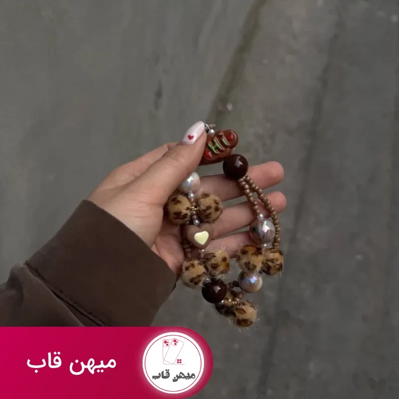 قاب آیفون مخملی پلنگی به همراه آویز توپی