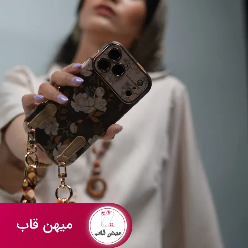 قاب موبایل آیفون گل فلاور کرم فندقی + بند ست اسکارف زنجیری