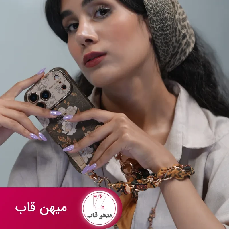 قاب موبایل آیفون گل فلاور کرم فندقی + بند ست اسکارف زنجیری