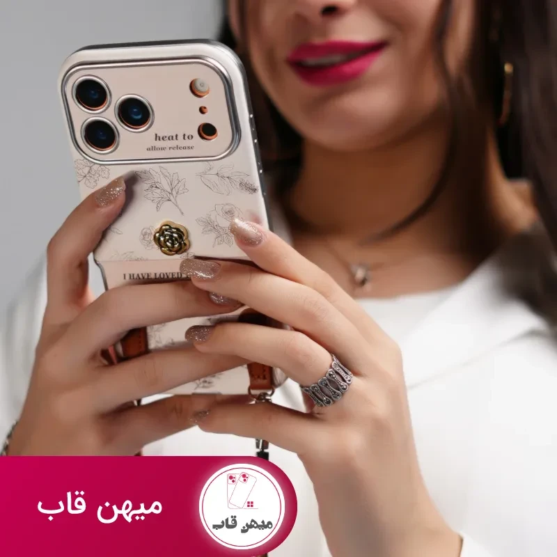 قاب موبایل آیفون گل طلایی انگلیسی الگانس محافظ لنزدار + بندست چرمی