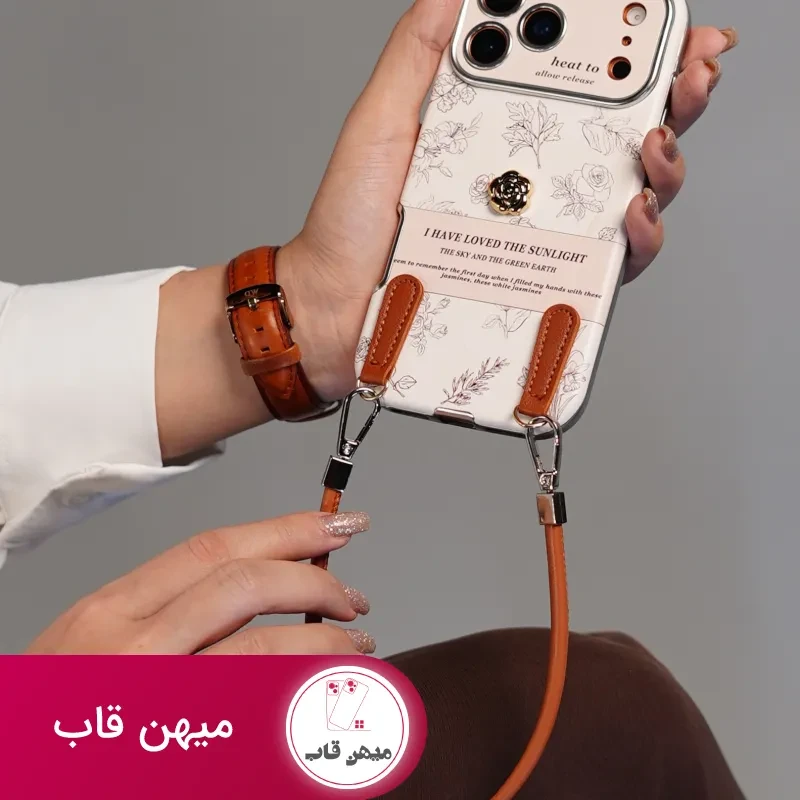 قاب موبایل آیفون گل طلایی انگلیسی الگانس محافظ لنزدار + بندست چرمی