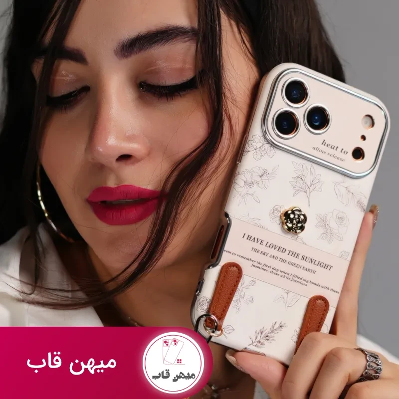 قاب موبایل آیفون گل طلایی انگلیسی الگانس محافظ لنزدار + بندست چرمی