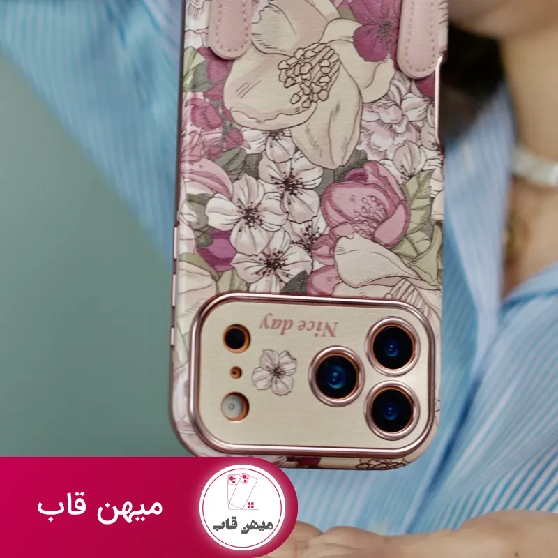 قاب موبایل آیفون شکوفه رویایی ویولا + 2تا بندست چرمی کوتاه و بلند