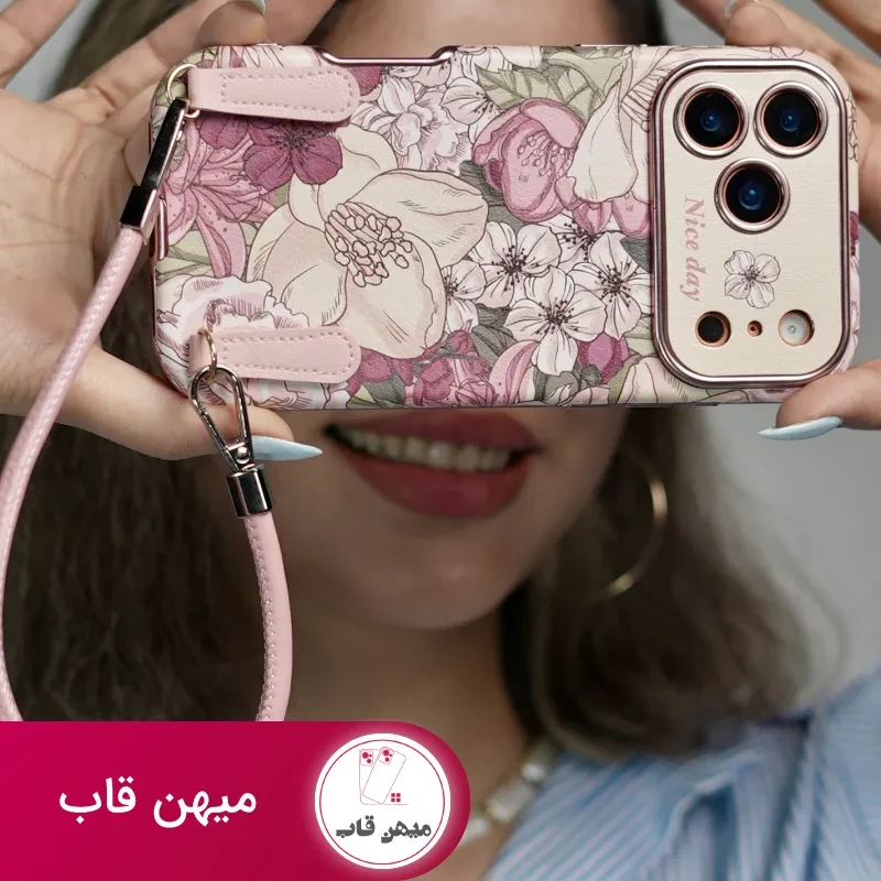 قاب موبایل آیفون شکوفه رویایی ویولا + 2تا بندست چرمی کوتاه و بلند