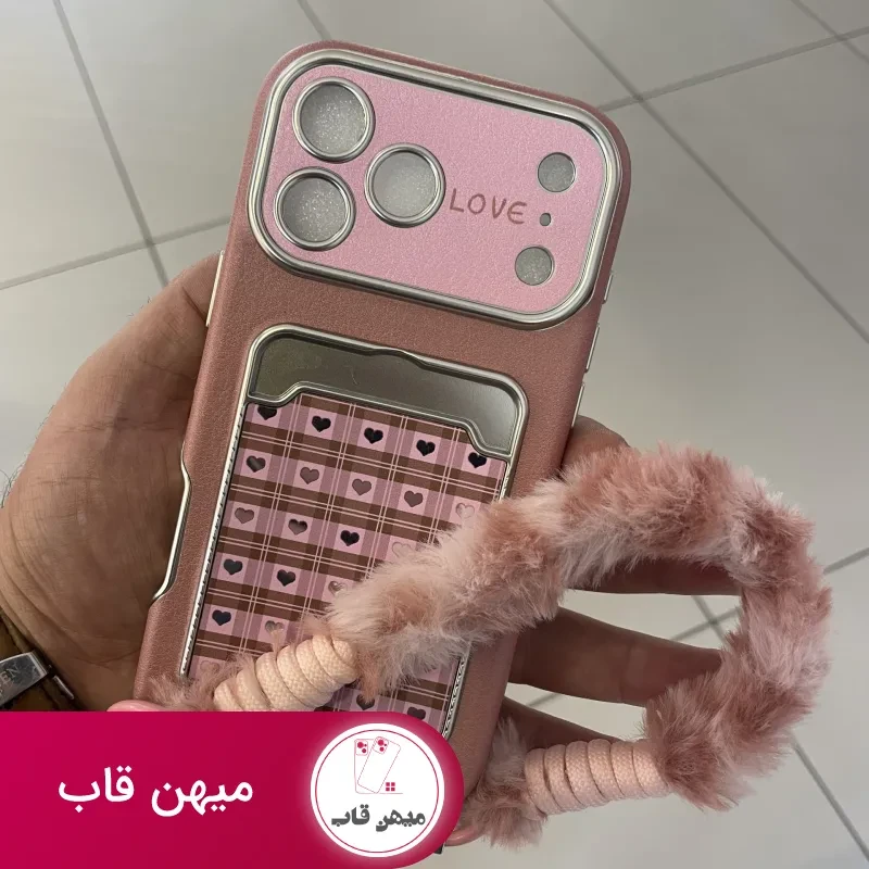 قاب موبایل آیفون قلب آیینه ای صورتی + بندست پشمی